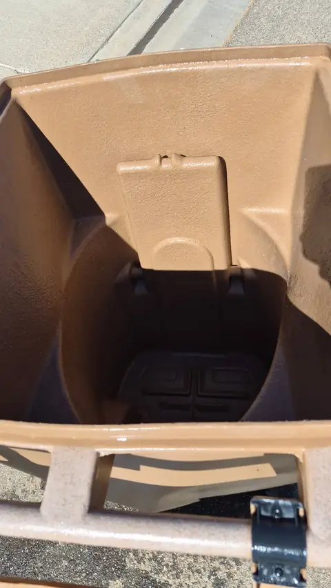Interior of the same brown trash bin after Bin Guardian cleaning